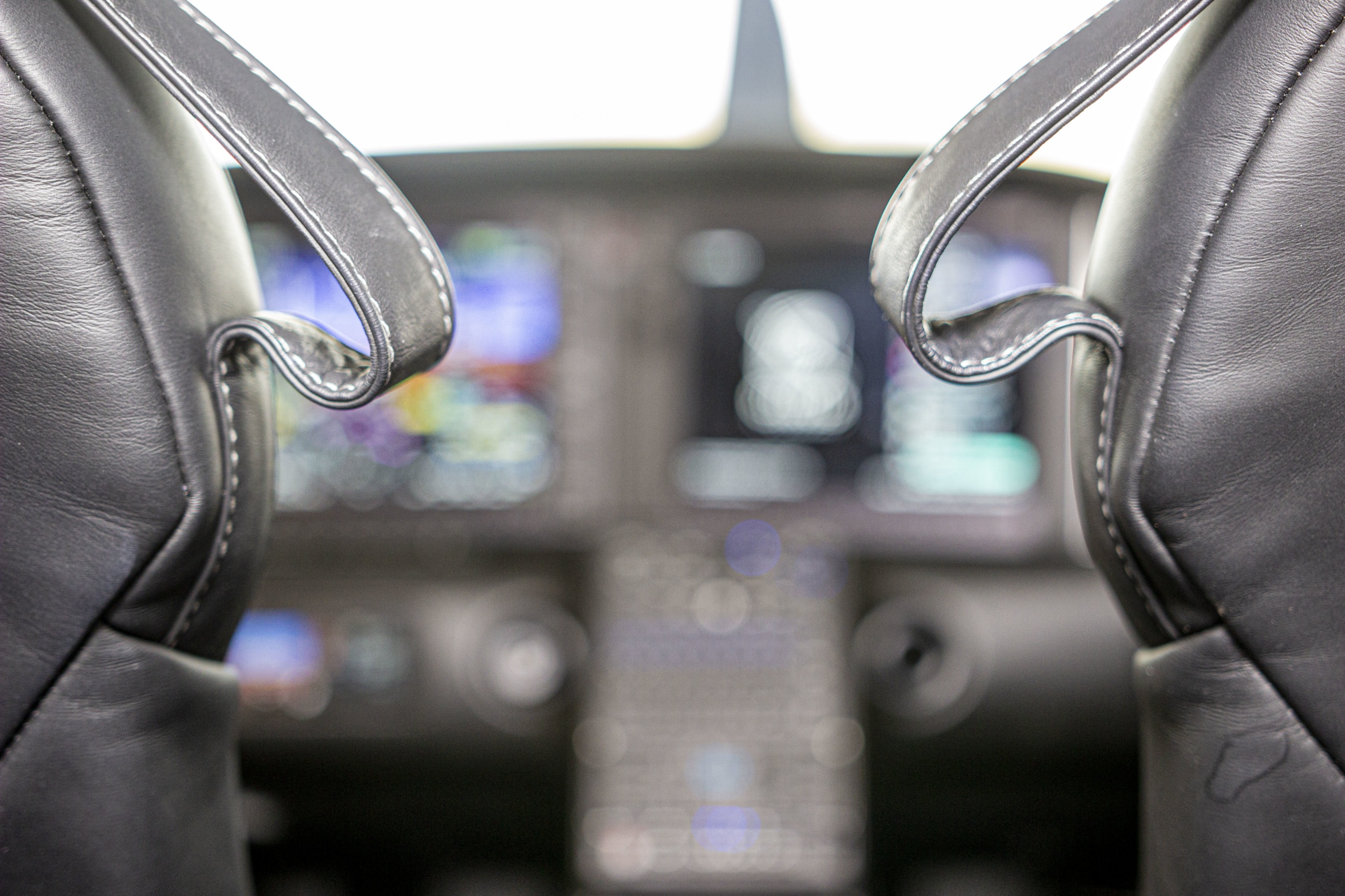 Headset straps add convenience inside our SR22T Cirrus Airpalnes